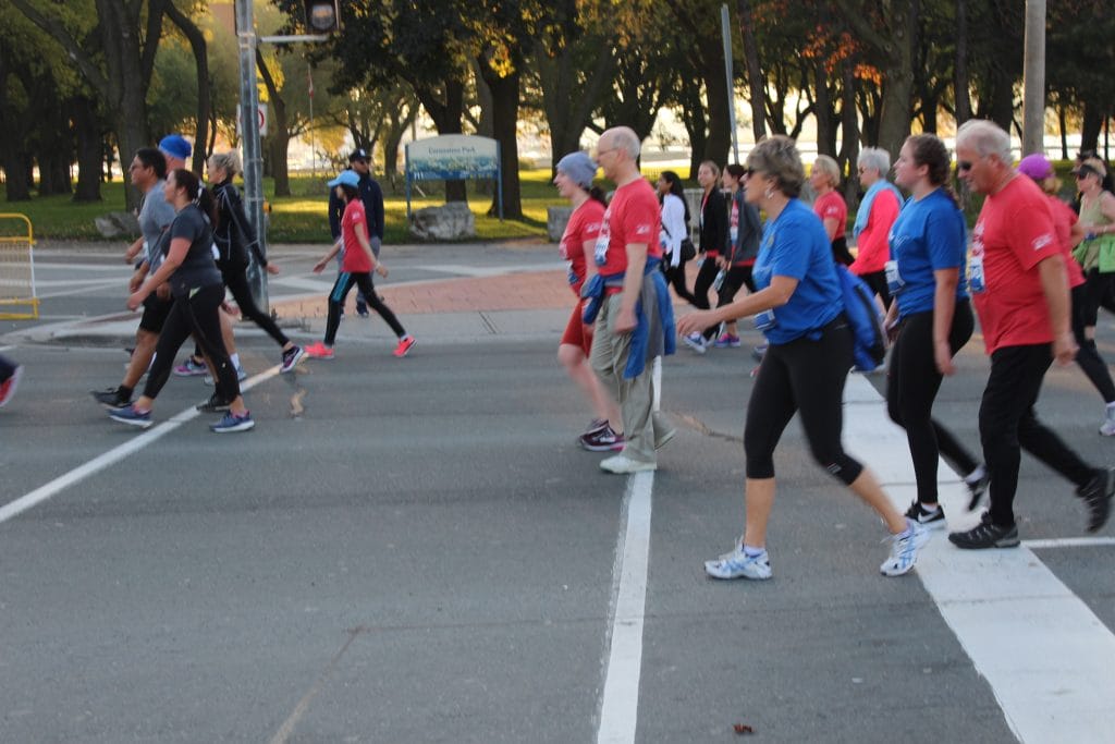 Group of people participating in the Scotiabank Waterfront Marathon.