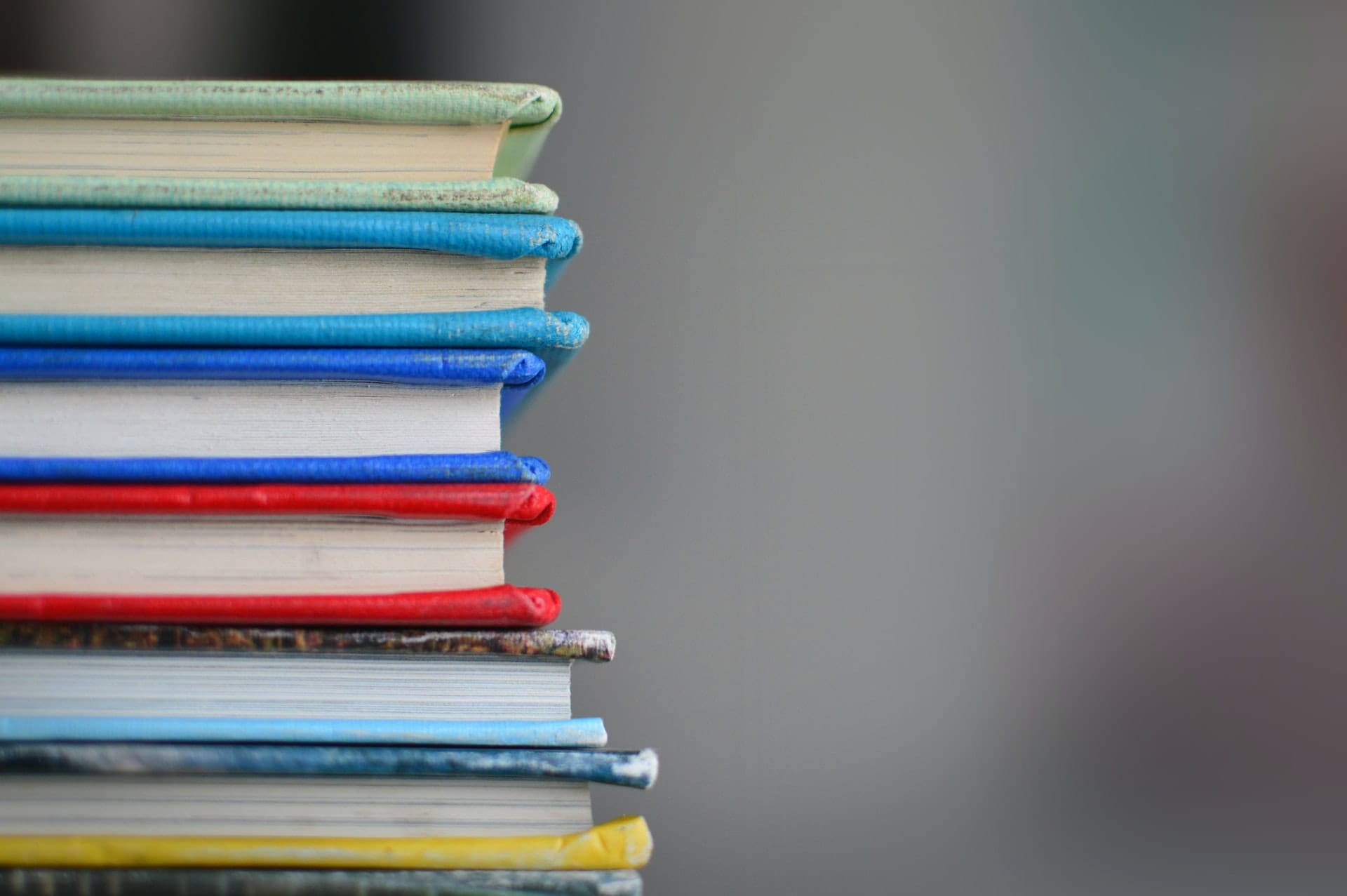 Stack of colourful books.