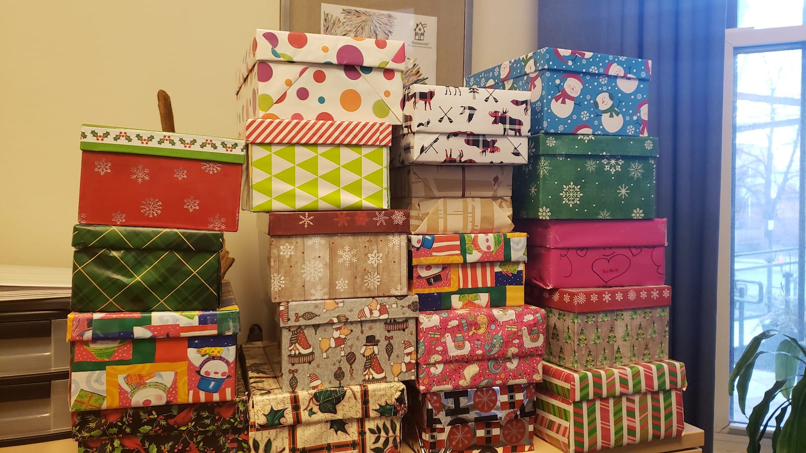 Presents wrapped and stacked up.